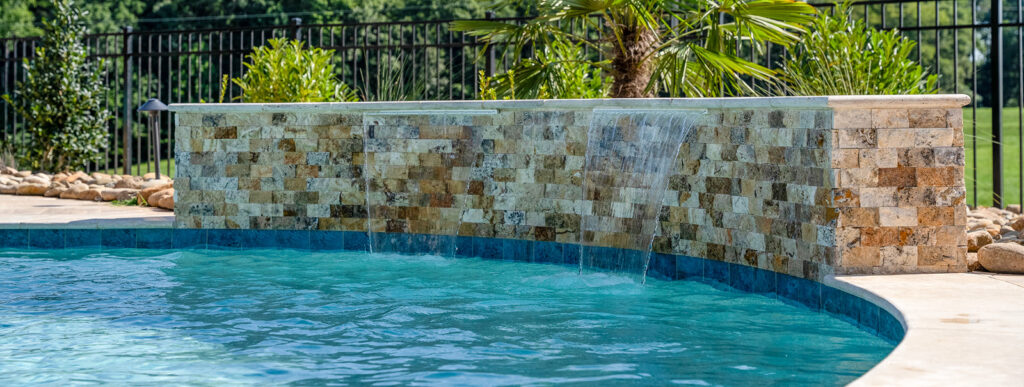 Double-cascade water feature on a swimming pool in Durham.