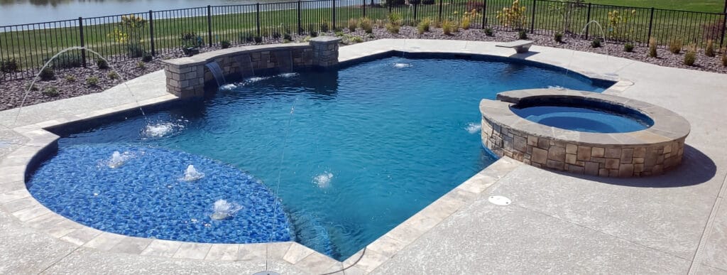 St. Louis backyard with Roman inground pool.