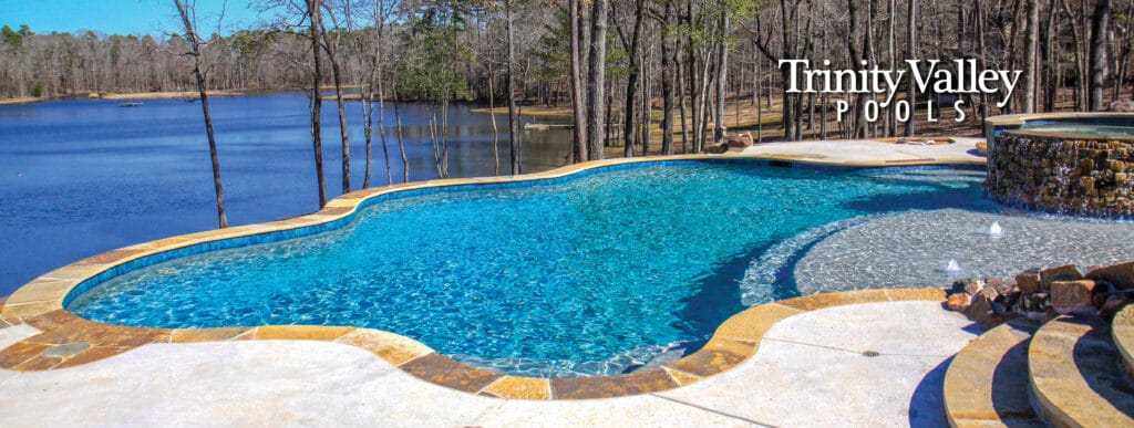 Inground pool overlooking lake in Tyler, Texas.