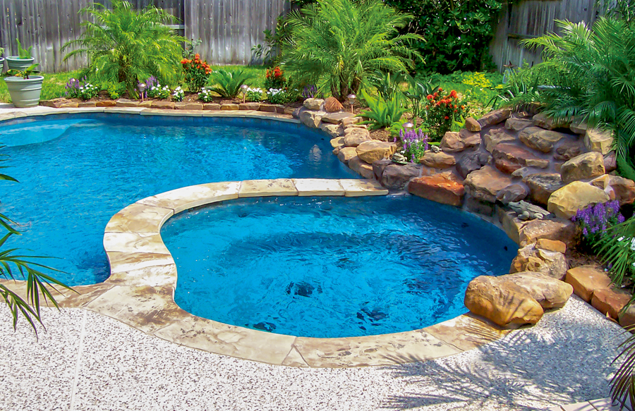 Interior organic circular spa installed inside custom pool