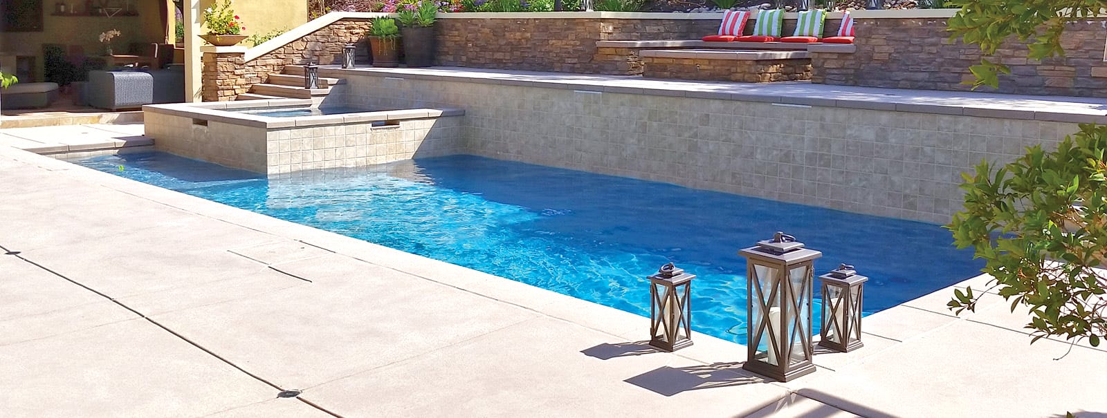 Outdoor pool design with custom backyard enhancements