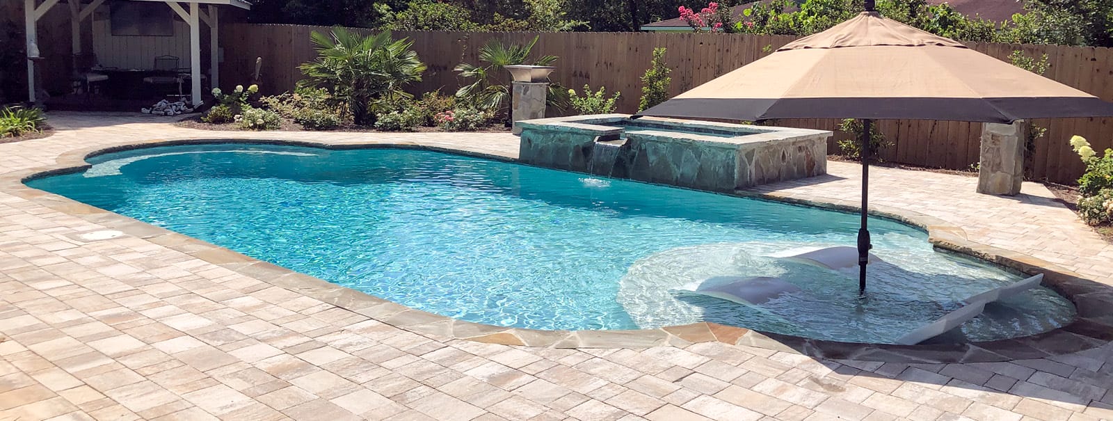 Showcasing backyard pool transformations in Mobile