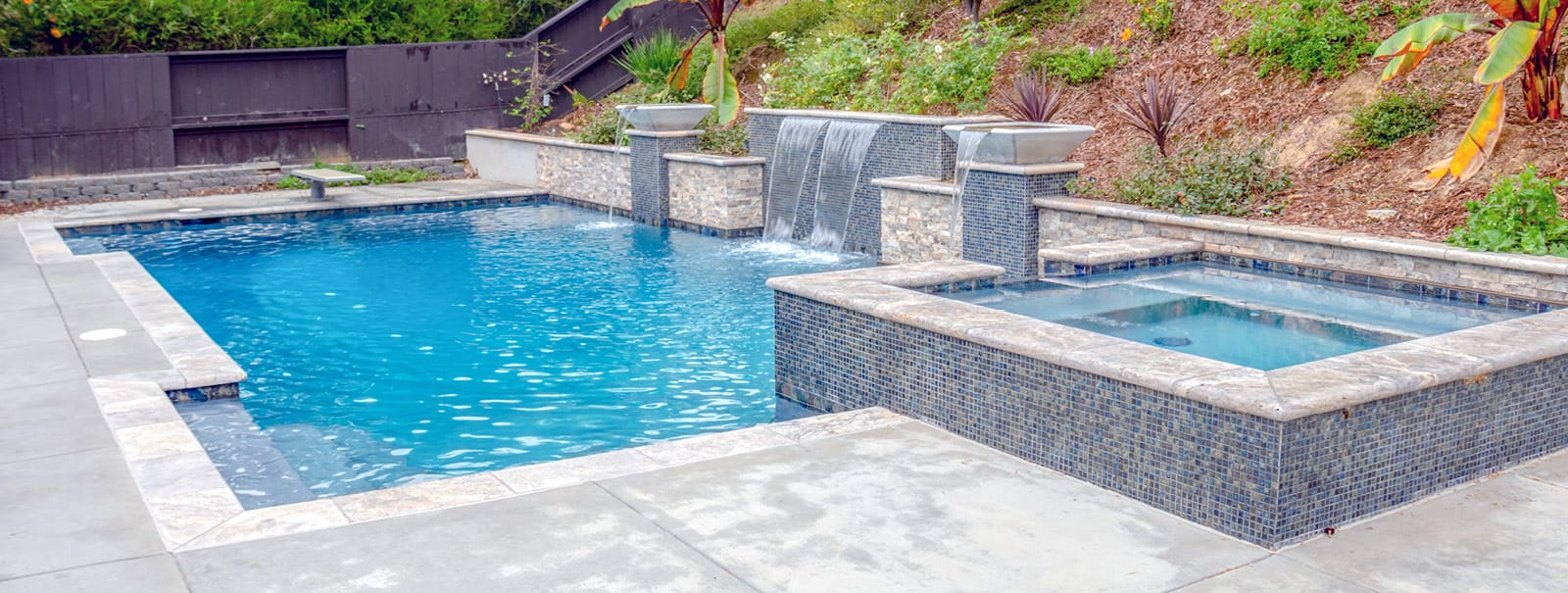 Custom inground pool with enhanced outdoor features