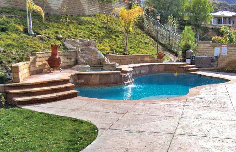 Backyard pool with premium custom design elements
