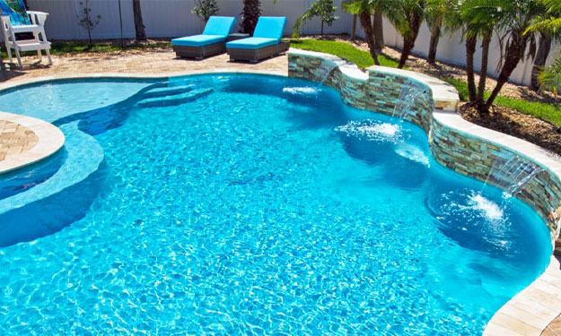 Luxury inground pool with elegant backyard landscaping in Jacksonville