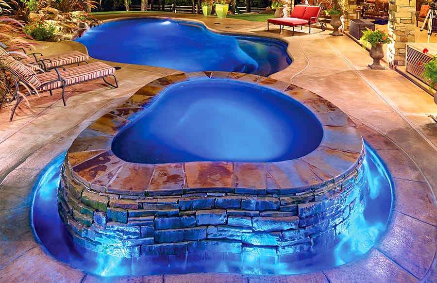 Inground swimming pool with custom outdoor design