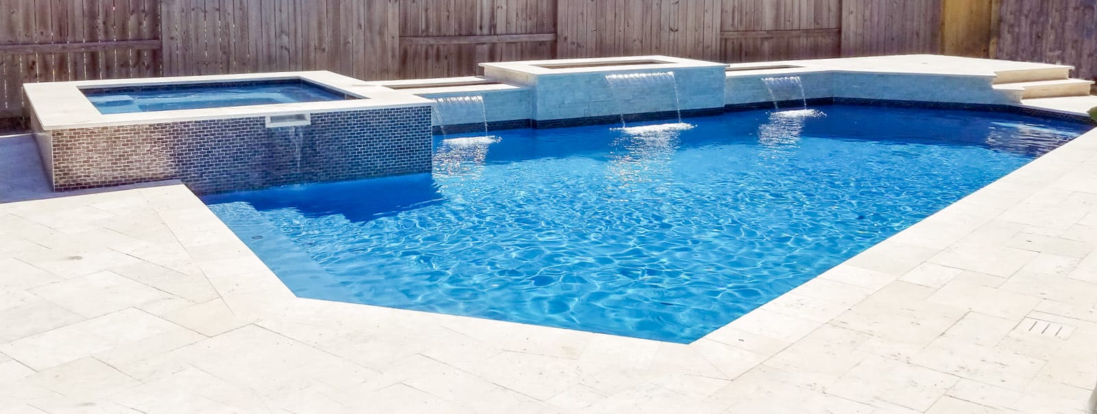 Enhancing outdoor areas with custom pool designs