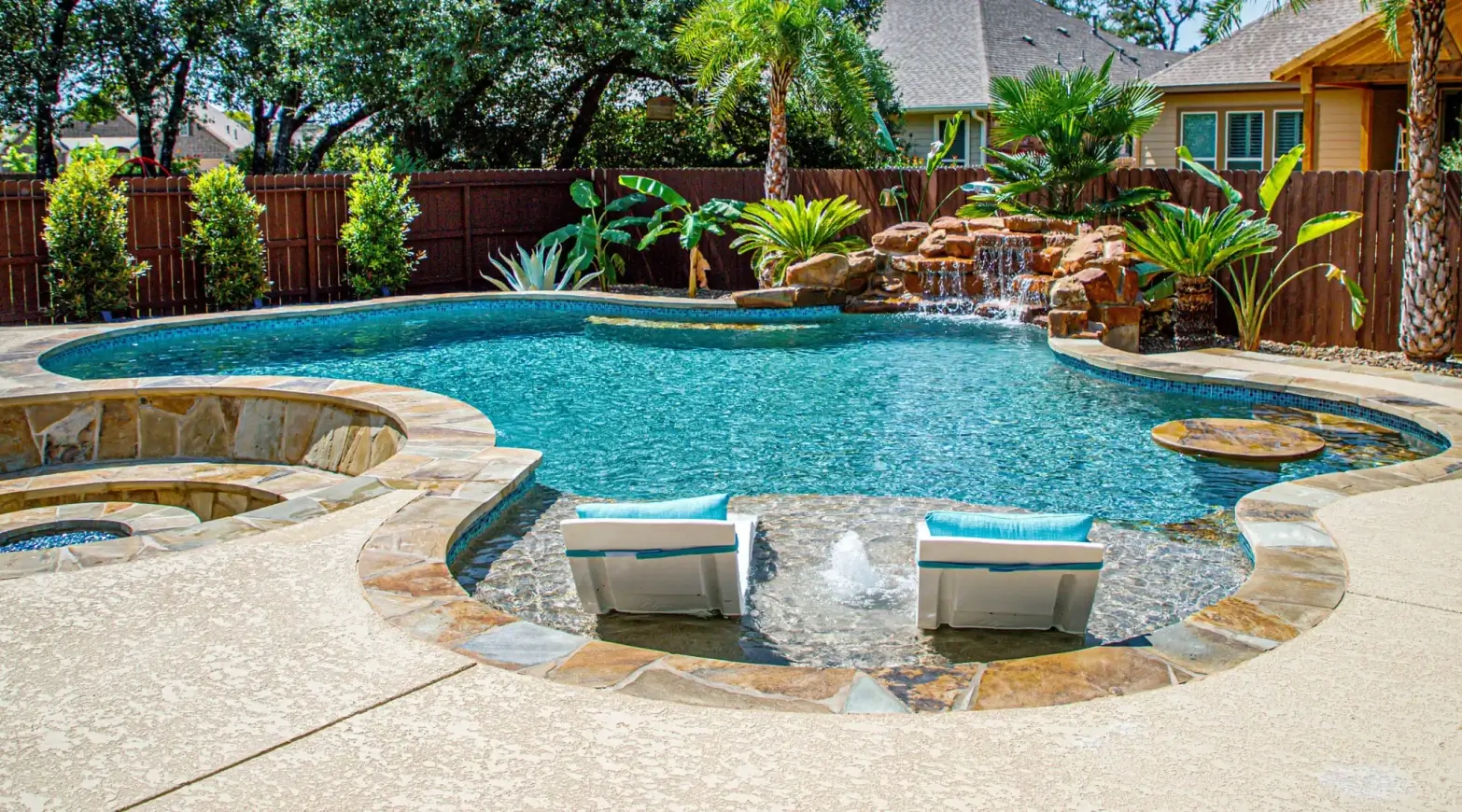 Custom pool installation with beautiful backyard layout