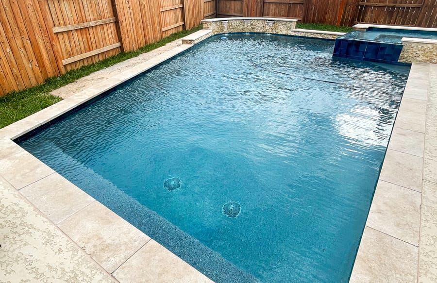 Custom inground swimming pool by Blue Haven in Bryan College Station