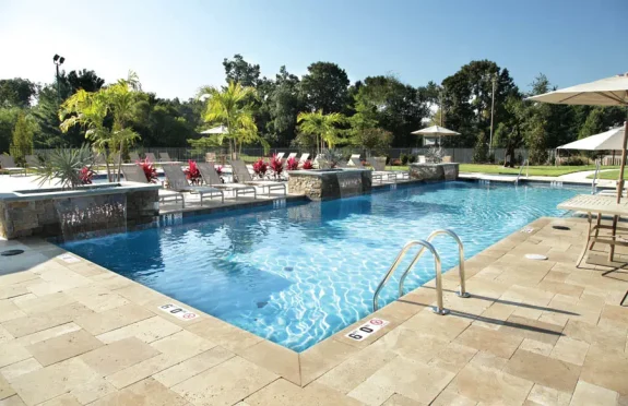 Luxury inground swimming pool design in Hudson Valley backyard