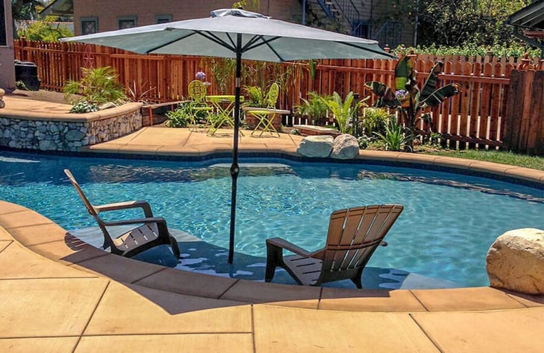 Pool remodel with tanning ledge upgrade
