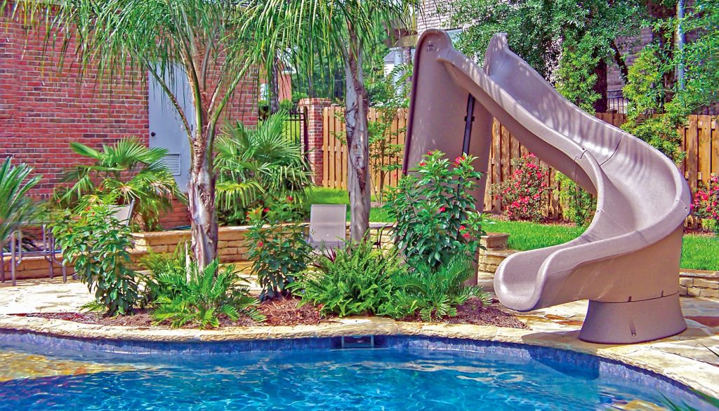 Deck mounted pool slide feature design