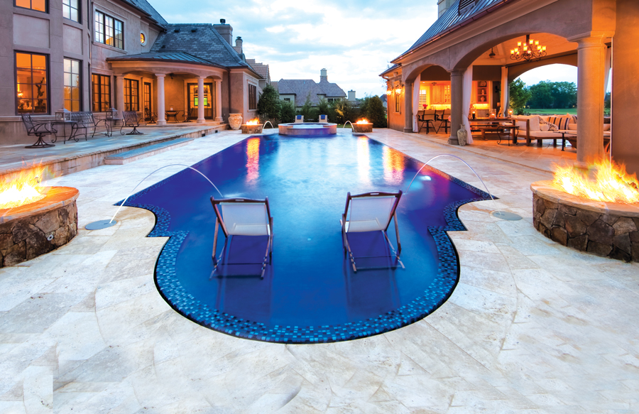 Roman-style custom inground swimming pool with elegant curved design