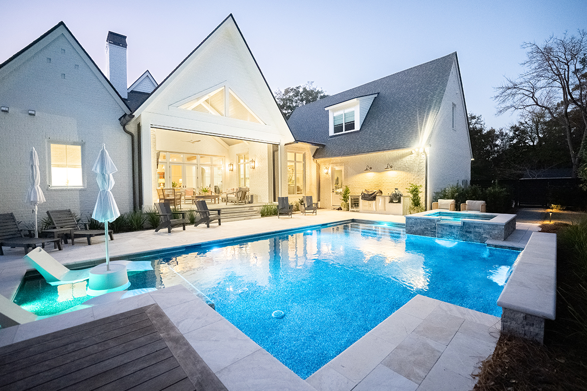 Custom residential swimming pool showcasing premium backyard design