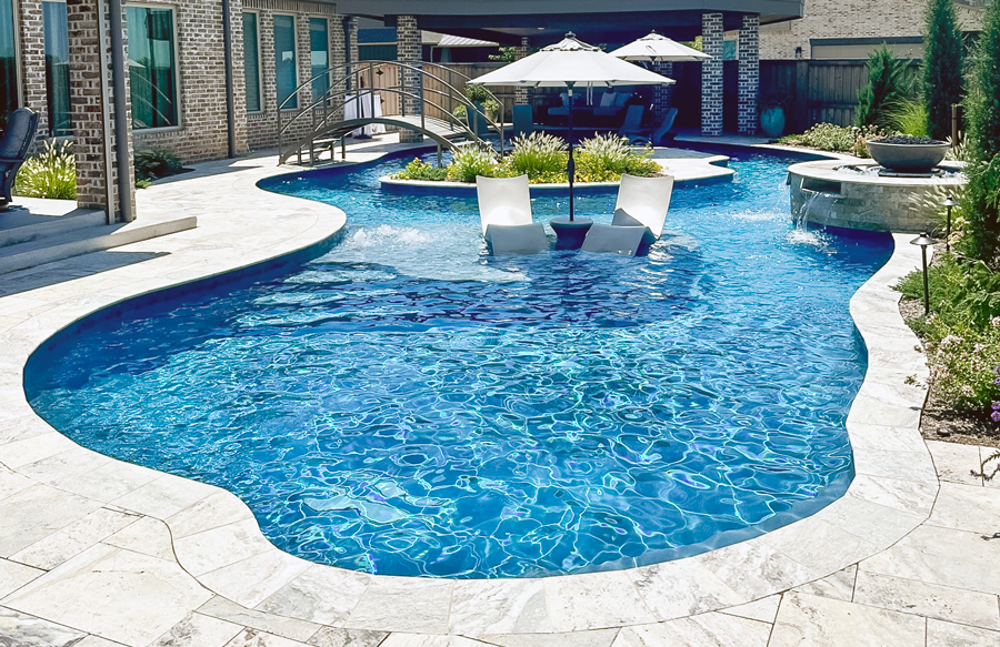 Freeform inground swimming pool with natural flowing contours