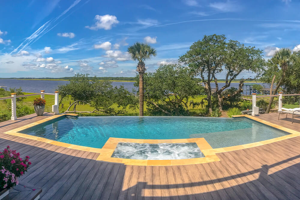 Transform backyard with renovated infinity pool overlooking view